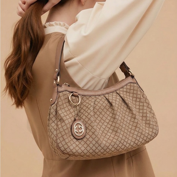 Gucci Handbags - Gucci Diamante canvas and leather Sukey Hobo bag